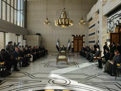 Syria's President Ahmed al-Sharaa meets representatives of the 15 members of the United Nations Security Council at the People's Palace in Damascus, Syria, December 4, 2025. REUTERS/Khalil Ashawi