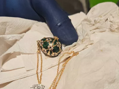 In this photo provided by the New Zealand Police a Faberg&eacute; pendant is held after it was recovered, Thursday, Dec. 4, 2025, from a man accused of stealing and swallowing the pendant. (New Zealand Police via AP)