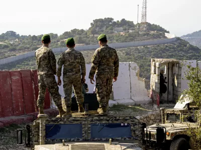 November 28, 2025, Wadi Zibqin, Wadi Zibqin, Lebanon: Lebanese soldiers look at an Israeli post opposite to their position the southern Lebanese border village in Alma al-Shaab during a media tour by the armed forces to review the operations in the southern Litani sector. The visit aimed to show the restoration of state control and disarming non-state actors in the region. This was described as a first-time event in the context of recent post-ceasefire operations. (Credit Image: &copy; Marwan Naamani/ZUMA Press Wire)