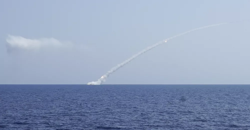 Long-range Kalibr cruise missile is launched by a Russian Navy submarine in the Mediterranean on Thursday, Sept. 14, 2017. Russia's military says it fired seven cruise missiles at Islamic State targets in the eastern Syrian province of Deir el-Zour. (AP Photo/Nataliya Vasilyeva)