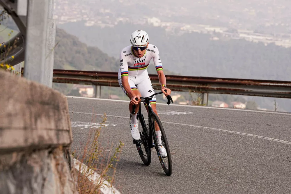 Reigning World Champion Tadej Pogacar pedals on his way to win Il Lombardia, Tour of Lombardy cycling race, in Bergamo, Italy, Saturday, Oct. 11, 2025. (Marco Alpozzi/LaPresse via AP)