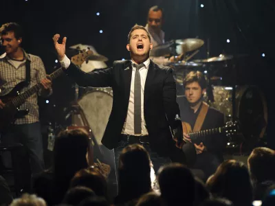 Singer Michael Buble performs songs from his new album "Christmas" at an iHeartRadio Live show at the P.C. Richard & Son Theater in New York, Tuesday, Nov. 8, 2011. (AP Photo/iHeartRadio, Chris Owyoung)