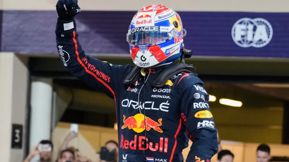 Red Bull driver Max Verstappen of the Netherlands celebrates the pole position after the qualifying for the he Abu Dhabi Formula One Grand Prix in Abu Dhabi, United Arab Emirates, Saturday, Dec. 6, 2025. (AP Photo/Darko Bandic)