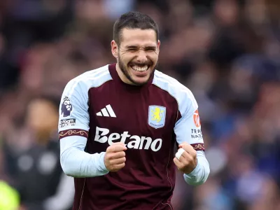 Soccer Football - Premier League - Aston Villa v Arsenal - Villa Park, Birmingham, Britain - December 6, 2025 Aston Villa's Emiliano Buendia celebrates after the match REUTERS/David Klein EDITORIAL USE ONLY. NO USE WITH UNAUTHORIZED AUDIO, VIDEO, DATA, FIXTURE LISTS, CLUB/LEAGUE LOGOS OR 'LIVE' SERVICES. ONLINE IN-MATCH USE LIMITED TO 120 IMAGES, NO VIDEO EMULATION. NO USE IN BETTING, GAMES OR SINGLE CLUB/LEAGUE/PLAYER PUBLICATIONS. PLEASE CONTACT YOUR ACCOUNT REPRESENTATIVE FOR FURTHER DETAILS..