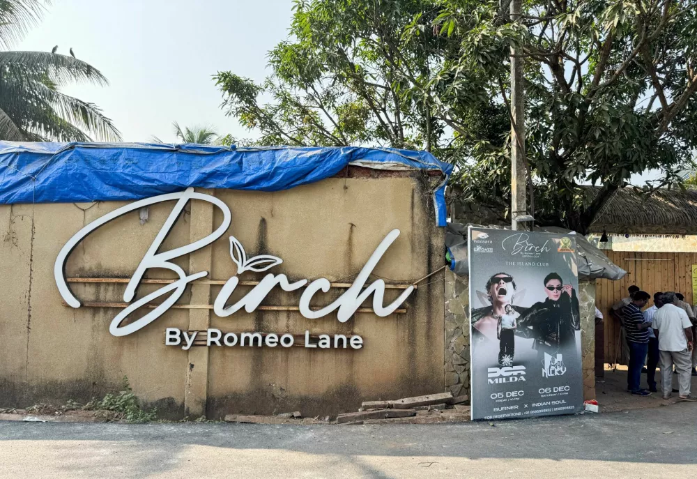 People stand outside the Birch by Romeo Lane nightclub, which has been sealed for investigation following a fire that killed multiple people, in Goa, India, December 7, 2025. REUTERS/Ali Monis Naqvi