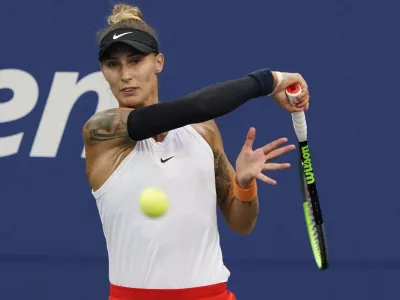 Polona Hercog, of Slovenia, strikes the ball during the first round of the US Open tennis championships, Tuesday, Aug. 31, 2021, in New York. (AP Photo/Elise Amendola)