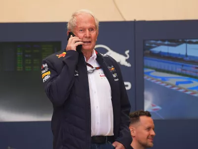 FILED - 01 March 2024, Bahrain, Sakhir: Helmut Marko, head of motorsport from the Oracle Red Bull Racing team, speaks on the phone in the paddock. Photo: Hasan Bratic/dpa
