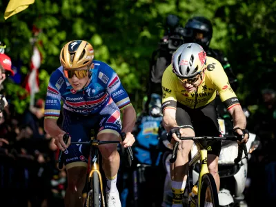 Race leaders Wout VAN AERT (BEL/Visma-Lease a bike) and Remco EVENEPOEL (BEL/Soudal Quick-Step) coming up the brutally steep Moskesstraat cobbles side-by-side, fighting for the win during the 65th De Brabantse Pijl 2025, a one day race from Beersel to Overijse in Belgium covering 163km on 18 April 2025. // Kristof Ramon / Red Bull Content Pool // SI202504190037 // Usage for editorial use only // 