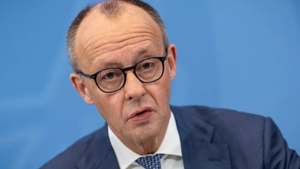 11 December 2025, Berlin: German Chancellor Friedrich Merz takes part in the press briefing on the results of the consultations following the coalition committee in the Chancellery. Photo: Michael Kappeler/dpa