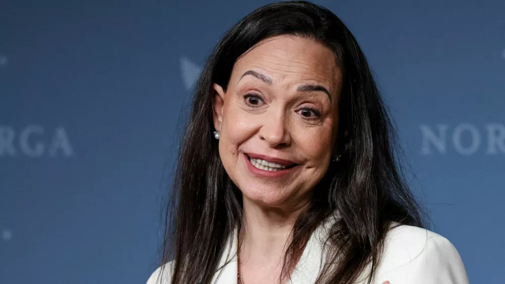 Nobel Peace Prize laureate and Venezuelan opposition leader Maria Corina Machado speaks during a press conference with Norwegian Prime Minister Jonas Gahr Stoere (not pictured), a day after the award ceremony, in Oslo, Norway December 11, 2025. REUTERS/Leonhard Foeger