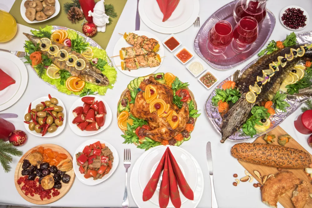 Lots of traditional festive food on table. Christmas table.