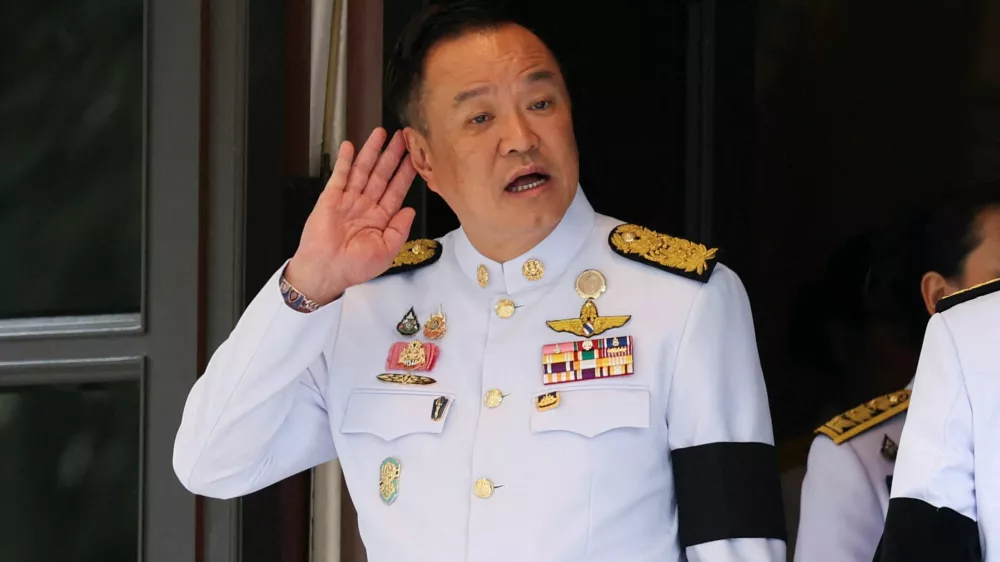 Thailand's Prime Minister Anutin Charnvirakul reacts, on the day he speaks to members of the media to announce the dissolution of parliament at the Government House, in Bangkok, Thailand, December 12, 2025. REUTERS/Chalinee Thirasupa   TPX IMAGES OF THE DAY