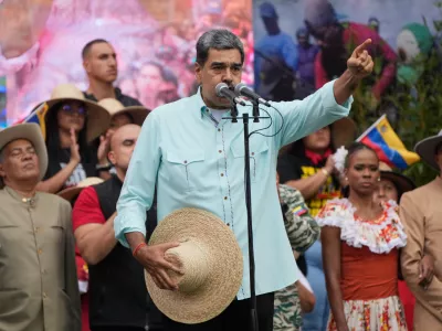 Nicolas Maduro speaks at a rally marking the anniversary of the Battle of Santa Ines, which took place during Venezuela's 19th-century Federal War, in Caracas, Venezuela, Wednesday, Dec. 10, 2025. (AP Photo/Ariana Cubillos)