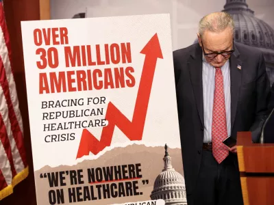 U.S. Senate Democratic Leader Chuck Schumer looks down during a news conference following Senate votes on competing healthcare plans, at the U.S. Capitol in Washington, D.C., U.S., December 11, 2025. REUTERS/Kevin Lamarque