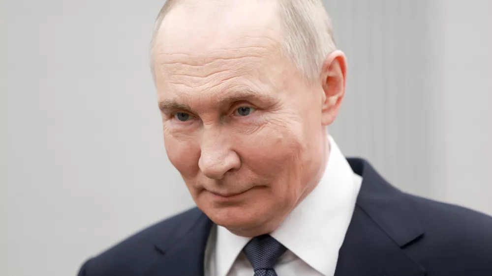 Russian President Vladimir Putin attends an international forum of civil participation "We Are Together" in Moscow, Russia, Wednesday, Dec. 3, 2025. (Alexander Shcherbak, Sputnik, Kremlin Pool Photo via AP)