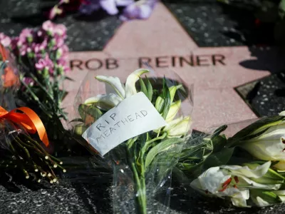Flowers and a note reading 'rip meathead' are placed at Rob Reiner's star on the Hollywood Walk of Fame after the actor-director and political activist and his wife were found dead, in Los Angeles, California, U.S., December 15, 2025. REUTERS/Daniel Cole