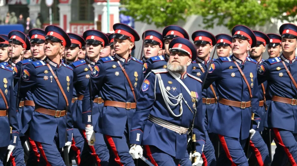 Russian Don Cossack soldiers march past the review stand during the annual Victory Day military parade through Red Square, May 9, 2025, in Moscow, Russia.Russia Celebrates 80th Anniversary Of Victory Over Nazi Germany In World War II, Moscow, Moscow Oblast - 09 May 2025,Image: 998679553, License: Rights-managed, Restrictions: ***HANDOUT image or SOCIAL MEDIA IMAGE or FILMSTILL for EDITORIAL USE ONLY! * Please note: Fees charged by Profimedia are for the Profimedia's services only, and do not, nor are they intended to, convey to the user any ownership of Copyright or License in the material. Profimedia does not claim any ownership including but not limited to Copyright or License in the attached material. By publishing this material you (the user) expressly agree to indemnify and to hold Profimedia and its directors, shareholders and employees harmless from any loss, claims, damages, demands, expenses (including legal fees), or any causes of action or allegation against Profimedia arising out of or connected in any way with publication of the material. Profimedia does not claim any copyright or license in the attached materials. Any downloading fees charged by Profimedia are for Profimedia's services only. * Handling Fee Only ***, Model Release: no