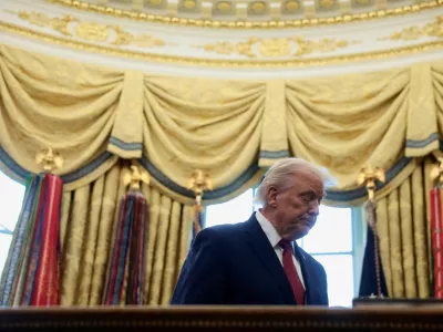 FILE PHOTO: U.S. President Donald Trump attends a Mexican Border Defense Medal presentation in the Oval Office at the White House in Washington, D.C., U.S., December 15, 2025. REUTERS/Evelyn Hockstein/File Photo