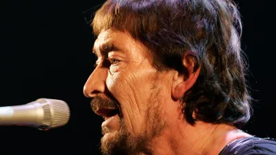 FILE - British rock musician Chris Rea performs during his first German concert of "The Return of the Fabulous Bluenotes" tour in Munich, Germany, on Feb. 7, 2008. (AP Photo/Christof Stache, File)