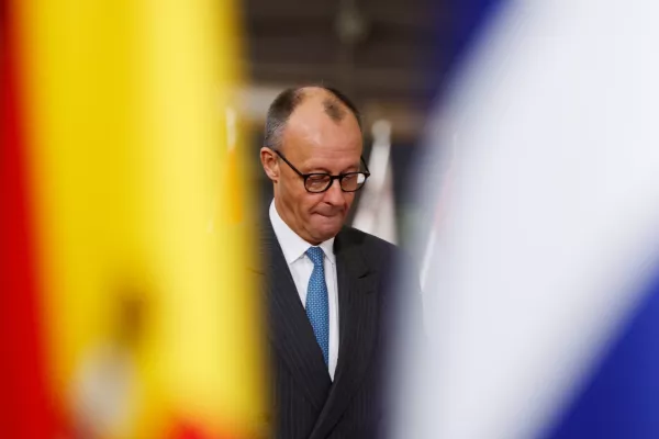 Germany's Chancellor Friedrich Merz arrives for the EU Summit in Brussels, Thursday, Dec. 18, 2025. (AP Photo/Geert Vanden Wijngaert)