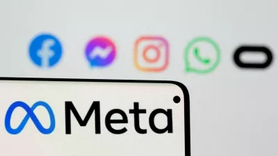 FILE PHOTO: Facebook's new rebrand logo Meta is seen on smartphone in front of displayed logo of Facebook, Messenger, Instagram, Whatsapp and Oculus in this illustration picture taken October 28, 2021. REUTERS/Dado Ruvic/Illustration/File Photo