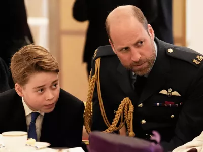 FILE - Prince William and Prince George join Second World War veterans at a tea party in Buckingham Palace, central London, Monday, May 5, 2025. (Jordan Pettitt/Pool Photo via AP, File)