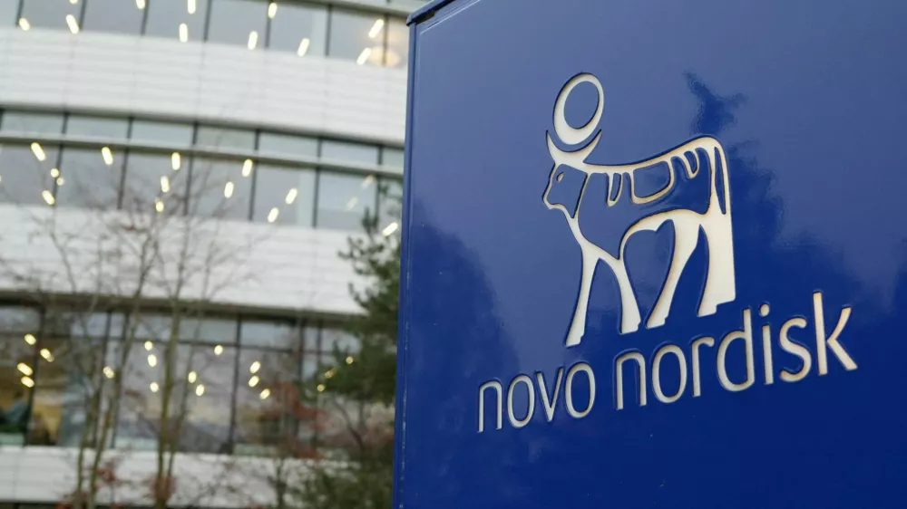 FILE PHOTO: The logo of pharmaceutical company Novo Nordisk is displayed in front of its offices in Bagsvaerd, on the outskirts of Copenhagen, Denmark, December 3, 2025. REUTERS/Tom Little/File Photo