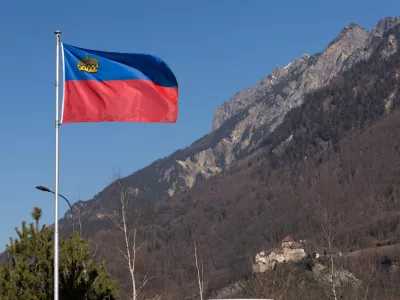 A flag of Liechtenstein flutters in front of the Vaduz Castle near Vaduz, Liechtenstein, March 3, 2025. REUTERS/Denis Balibouse