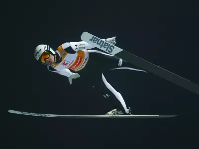 Ski Jumping - FIS Ski Jumping World Cup - Klingenthal, Germany - December 12, 2025 Slovenia's Domen Prevc in action during the Men's Individual Large Hill qualification REUTERS/Lisi Niesner
