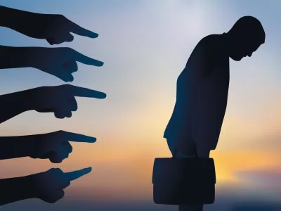 Concept of arbitrary dismissal and discrimination with a man singled out and accused before being fired from work.