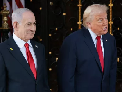 U.S. President Donald Trump speaks next to Israeli Prime Minister Benjamin Netanyahu upon arrival for meetings at Trump's Mar-a-Lago club in Palm Beach, Florida, U.S., December 29, 2025. REUTERS/Jonathan Ernst