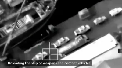 This frame grab from video broadcast by Saudi state television on Tuesday, Dec. 30, 2025, shows what the kingdom describes as a shipment of weapons and armored vehicles coming from the United Arab Emirates, at Mukalla, Yemen. (Saudi state television via AP)