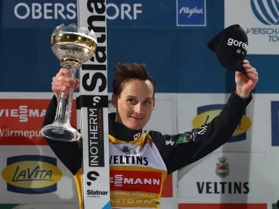 Ski Jumping - Four Hills Tournament - Oberstdorf, Germany - December 29, 2025 Slovenia's Domen Prevc celebrates on the podium after winning the Men's Individual HS137 REUTERS/Kai Pfaffenbach