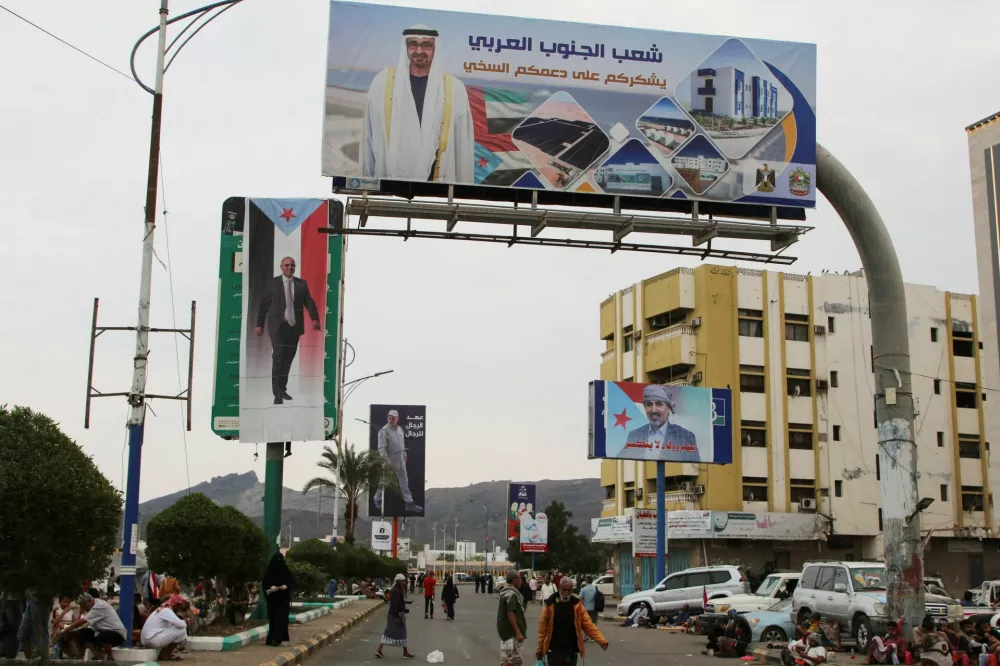 Billboards with images of Sheikh Mohamed bin Zayed Al Nahyan, President of the United Arab Emirates and Aidarous al-Zubaidi, the head of the UAE-backed separatist Southern Transitional Council (STC), in Aden, Yemen, December 30, 2025. REUTERS/Fawaz Salman