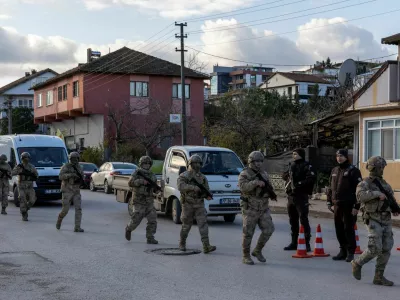 Turkish gendarmerie special forces team leaves the site where Turkish security forces launched an operation on a house believed to contain suspected Islamic State militants, and where, according to state media, seven officers were wounded in a clash, in Yalova province, Turkey, December 29, 2025. REUTERS/Umit Bektas