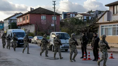 Turkish gendarmerie special forces team leaves the site where Turkish security forces launched an operation on a house believed to contain suspected Islamic State militants, and where, according to state media, seven officers were wounded in a clash, in Yalova province, Turkey, December 29, 2025. REUTERS/Umit Bektas