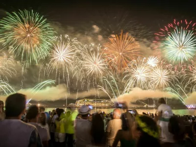 New Year's celebration in Copacabana, Rio de Janeiro, during the world famous fifteen minutes fireworks burning.