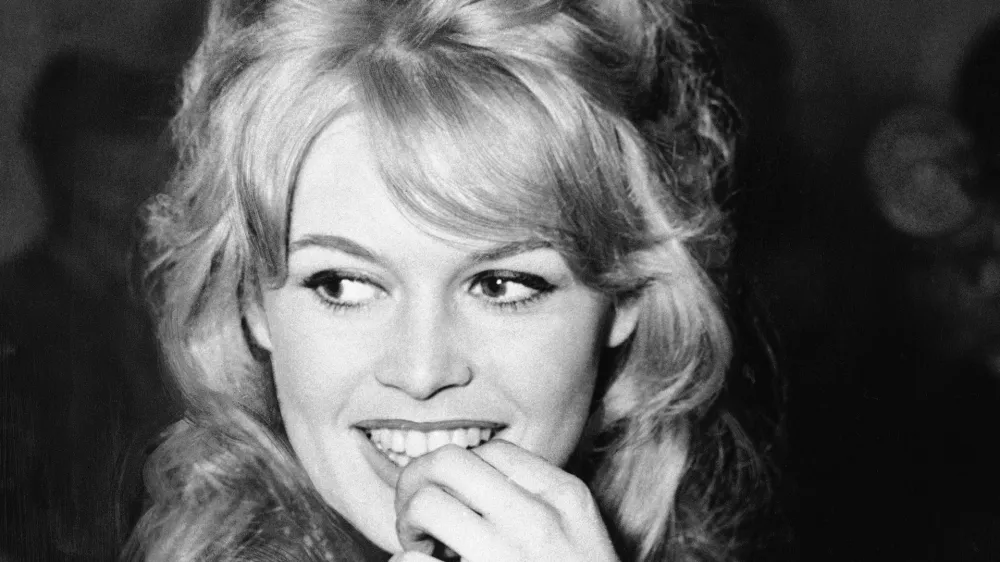 FILE - French film actress Brigitte Bardot appears at the Mount Royal Hotel in London on April 9, 1959. (AP Photo/Dave Dawson, File)