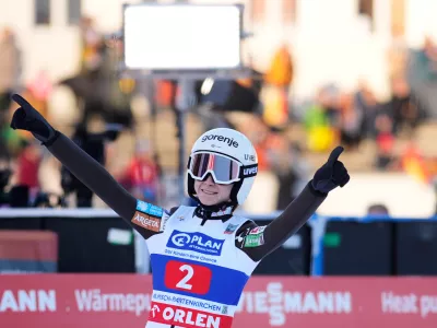 Nika Prevc, of Slovenia, reacts after her second round jump at the women's ski jumping World Cup competition in Garmisch-Partenkirchen, Germany, Wednesday, Dec. 31, 2025. (AP Photo/Matthias Schrader)