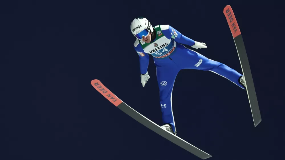 31 December 2025, Bavaria, Garmisch-Partenkirchen: Slovenia's Timi Zajc competes in the men's large hill qualification at the Four Hills Tournament World Cup ski jumping event. Photo: Daniel Karmann/dpa