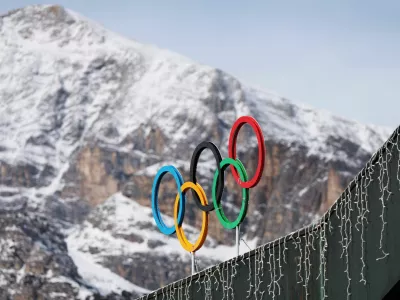 FILE PHOTO: A general view shows the Olympic rings on the Cortina Curling Olympic Stadium, which will host the curling, wheelchair curling, and Paralympic closing ceremony during the Milano Cortina Winter Olympic Games 2026, in Cortina, Italy, January 25, 2025. REUTERS/Claudia Greco/File Photo/File Photo