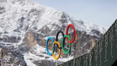 FILE PHOTO: A general view shows the Olympic rings on the Cortina Curling Olympic Stadium, which will host the curling, wheelchair curling, and Paralympic closing ceremony during the Milano Cortina Winter Olympic Games 2026, in Cortina, Italy, January 25, 2025. REUTERS/Claudia Greco/File Photo/File Photo