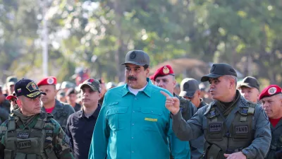 FILE PHOTO: Venezuela's President Nicolas Maduro speaks with Venezuela's Defense Minister Vladimir Padrino Lopez and Remigio Ceballos Strategic Operational Commander of the Bolivarian National Armed Forces, during a military exercise in Valencia, Venezuela January 27, 2019. Miraflores Palace/Handout via REUTERS ATTENTION EDITORS - THIS PICTURE WAS PROVIDED BY A THIRD PARTY./File Photo