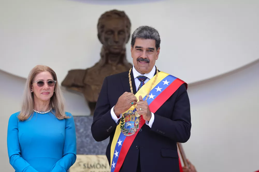 FILED - 10 January 2025, Venezuela, Caracas: Venezuelan President Nicolas Maduro and his wife Cilia Flores smile after being sworn in again as President of Venezuela in the National Assembly. Photo: Andres Gonzalez/dpa