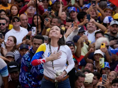 FILE - Venezuelan opposition leader Maria Corina Machado addresses supporters at a protest against President Nicolas Maduro in Caracas, Venezuela, Jan. 9, 2025, the day before his inauguration for a third term. (AP Photo/Ariana Cubillos, File)