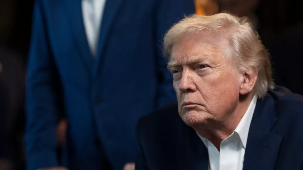 In this photo released by the White House, President Donald Trump monitors U.S. military operations in Venezuela, with CIA Director John Ratcliffe, left, at Mar-a-Lago in Palm Beach, Fla., Saturday, Jan. 3, 2026. (Molly Riley/The White House via AP)