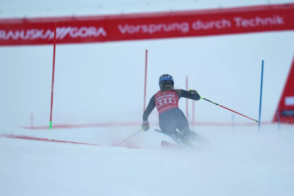 United States' Mikaela Shiffrin speeds down the course during an alpine ski, women's World Cup slalom, in Kranjska Gora, Slovenia, Sunday, Jan. 4, 2026. (AP Photo/Marco Trovati)