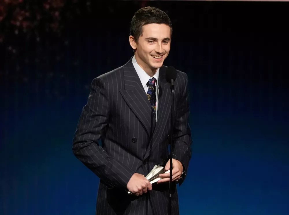 Timoth&eacute;e Chalamet accepts the award for best actor for "Marty Supreme" during the 31st Annual Critics Choice Awards on Sunday, Jan. 4, 2026, at The Barker Hanger in Santa Monica, Calif. (AP Photo/Chris Pizzello)
