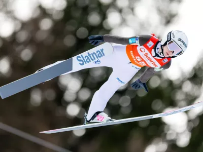 Nika Prevc of Slovenia soars through the air during the women's FIS Ski Jumping World Cup competition at the Gross-Titlis Schanze, in Engelberg, Switzerland, Saturday, Dec. 20, 2025. (Philipp Schmidli/Keystone via AP)