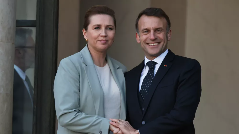 French President Emmanuel Macron welcomes Denmark's Prime Minister Mette Frederiksen before a meeting of the 'Coalition of the Willing' on Ukraine, in Paris, France, Tuesday, Jan. 6, 2026. (AP Photo/Thomas Padilla)